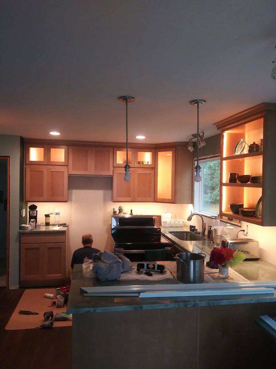 Kitchen remodel with pendant, cabinet and task lighting